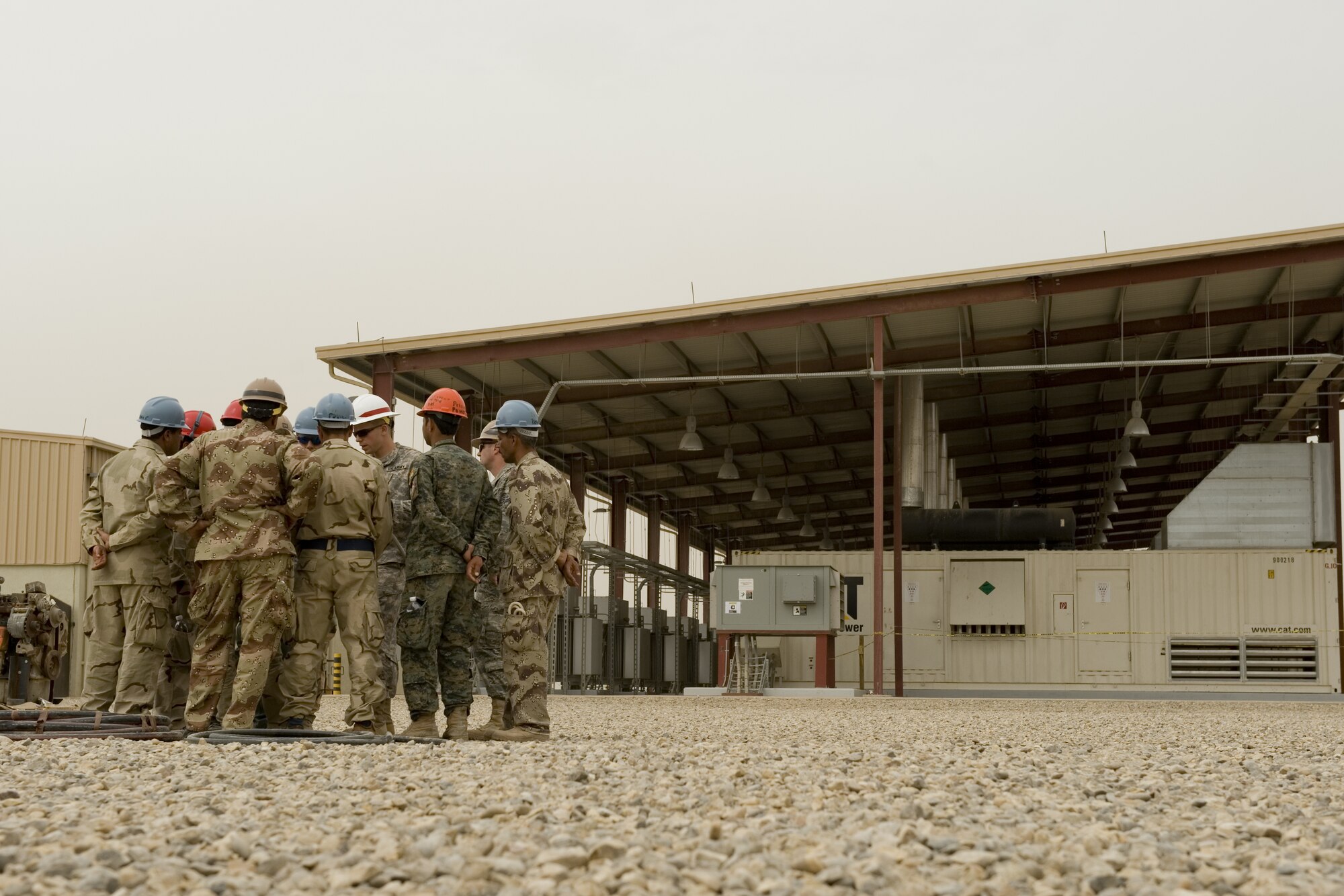 ALI AIR BASE, Iraq -- Iraqi students learn how to assemble power distribution cables at a power plant April 20. The students were part of a prime power class designed to teach Iraqi servicemembers how to generate, maintain and distribute power in order to operate their bases after the U.S. withdrawal scheduled for Dec. 31, 2011. (U.S. Air Force photo by Staff Sgt. Levi Riendeau)

