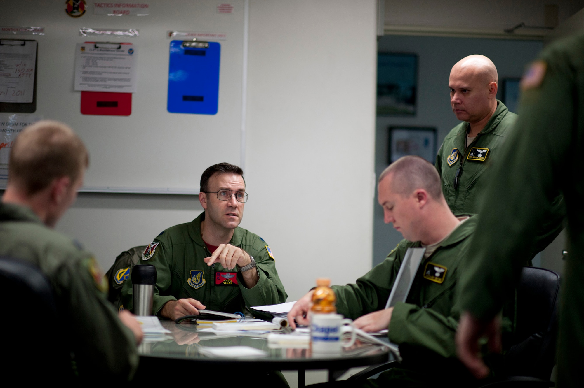YOKOTA AIR BASE, Japan -- Lt. Col. Dave Kincaid, 374th Operations Group deputy commander, conducts a pre-flight meeting for Operation Water Buoy at the 36th Airlift Squadron building, Yokota Air Base, Japan, April 29, 2011. The C-130 Hercules crew dropped seven Davis Drifter Buoys off the eastern coast of Japan to help Japanese and American scientists monitor ocean currents. (U.S. Air Force photo/Staff Sgt. Samuel Morse)
