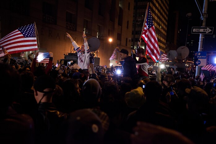 A crowd cheers and chants in excitement at the corner of Vesey St. and Liberty St. next to Ground Zero after hearing that Osama Bin Laden is dead. Bin Laden planned the attacks, Sept 11, 2001 and has been hunted by American forces in the years since. He was killed by a raid in Abbottabad, Pakistan near the country's capital. The Freedom Tower, the skyscraper being built where the World Trade Center towers once stood, is now 60 stories tall and was lit up and visible from the street. Eventually the Freedom Tower will be the tallest building in the country.
