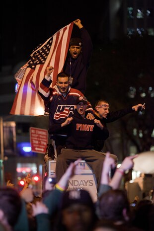 A crowd cheers and chants in excitement at the corner of Vesey St. and Liberty St. next to Ground Zero after hearing that Osama Bin Laden is dead. Bin Laden planned the attacks, Sept 11, 2001 and has been hunted by American forces in the years since. He was killed by a raid in Abbottabad, Pakistan near the country's capital. The Freedom Tower, the skyscraper being built where the World Trade Center towers once stood, is now 60 stories tall and was lit up and visible from the street. Eventually the Freedom Tower will be the tallest building in the country.