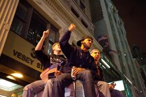 A crowd cheers and chants in excitement at the corner of Vesey St. and Liberty St. next to Ground Zero after hearing that Osama Bin Laden is dead. Bin Laden planned the attacks, Sept 11, 2001 and has been hunted by American forces in the years since. He was killed by a raid in Abbottabad, Pakistan near the country's capital. The Freedom Tower, the skyscraper being built where the World Trade Center towers once stood, is now 60 stories tall and was lit up and visible from the street. Eventually the Freedom Tower will be the tallest building in the country.