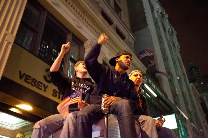 A crowd cheers and chants in excitement at the corner of Vesey St. and Liberty St. next to Ground Zero after hearing that Osama Bin Laden is dead. Bin Laden planned the attacks, Sept 11, 2001 and has been hunted by American forces in the years since. He was killed by a raid in Abbottabad, Pakistan near the country's capital. The Freedom Tower, the skyscraper being built where the World Trade Center towers once stood, is now 60 stories tall and was lit up and visible from the street. Eventually the Freedom Tower will be the tallest building in the country.