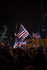 A crowd cheers and chants in excitement at the corner of Vesey St. and Liberty St. next to Ground Zero after hearing that Osama Bin Laden is dead. Bin Laden planned the attacks on Sept 11, 2001 and has been hunted by American forces in the years since. He was killed by a raid in Abbottabad, Pakistan near the country's capital. The Freedom Tower, the skyscraper being built where the World Trade Center towers once stood, is now 60 stories tall and was lit up and visible from the street. Eventually the Freedom Tower will be the tallest building in the country.