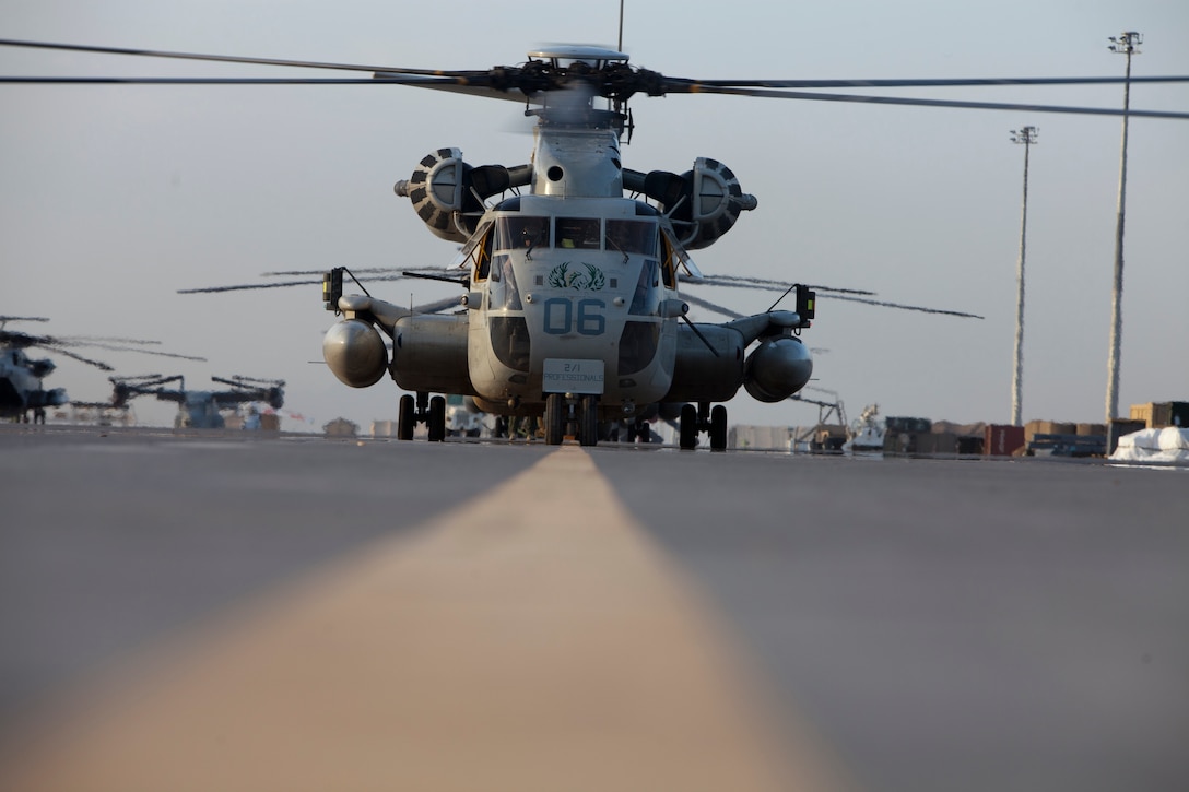 The CH-53D, one of the oldest aircraft in the Marine Corps, recently added a new trick to its arsenal in support of operations in Afghanistan, Aug. 17. The aircraft, from Marine Heavy Helicopter Squadron 463, conducted rapid ground refueling of AH-1W Super Cobras, allowing the smaller attack helicopters to allow them to fly farther and longer on combat operations. ::r::::n::
