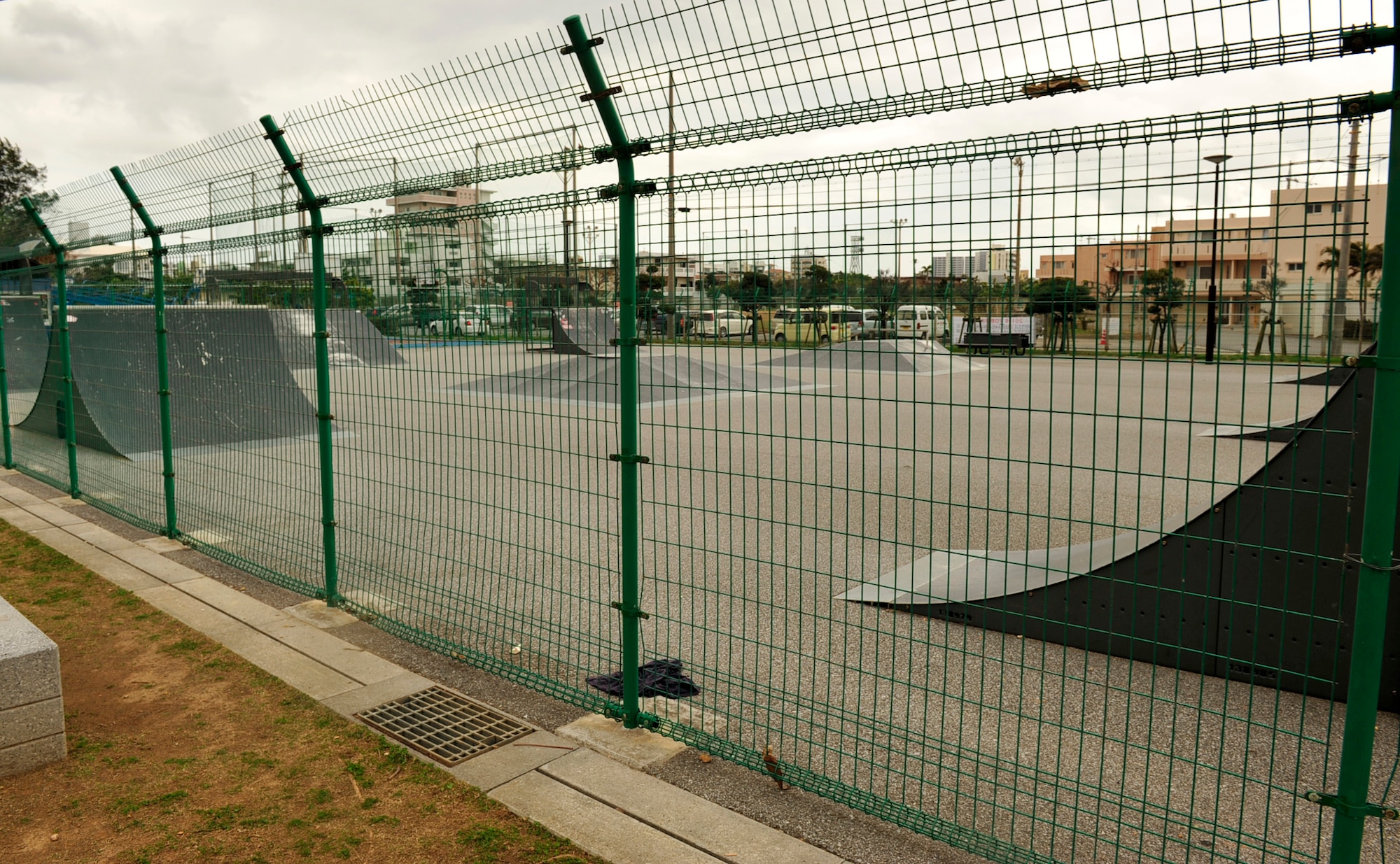 The Sunabe Baba Park, pictured here, has a skating park, dolphin-shaped playground, softball field and basketball court, and islocated in Chatan Town.  Skating and other activities alike are only allowed in designated areas inside the park, not on the surrounding streets. (U.S. Air Force photo/Senior Airman Sara Csurilla)