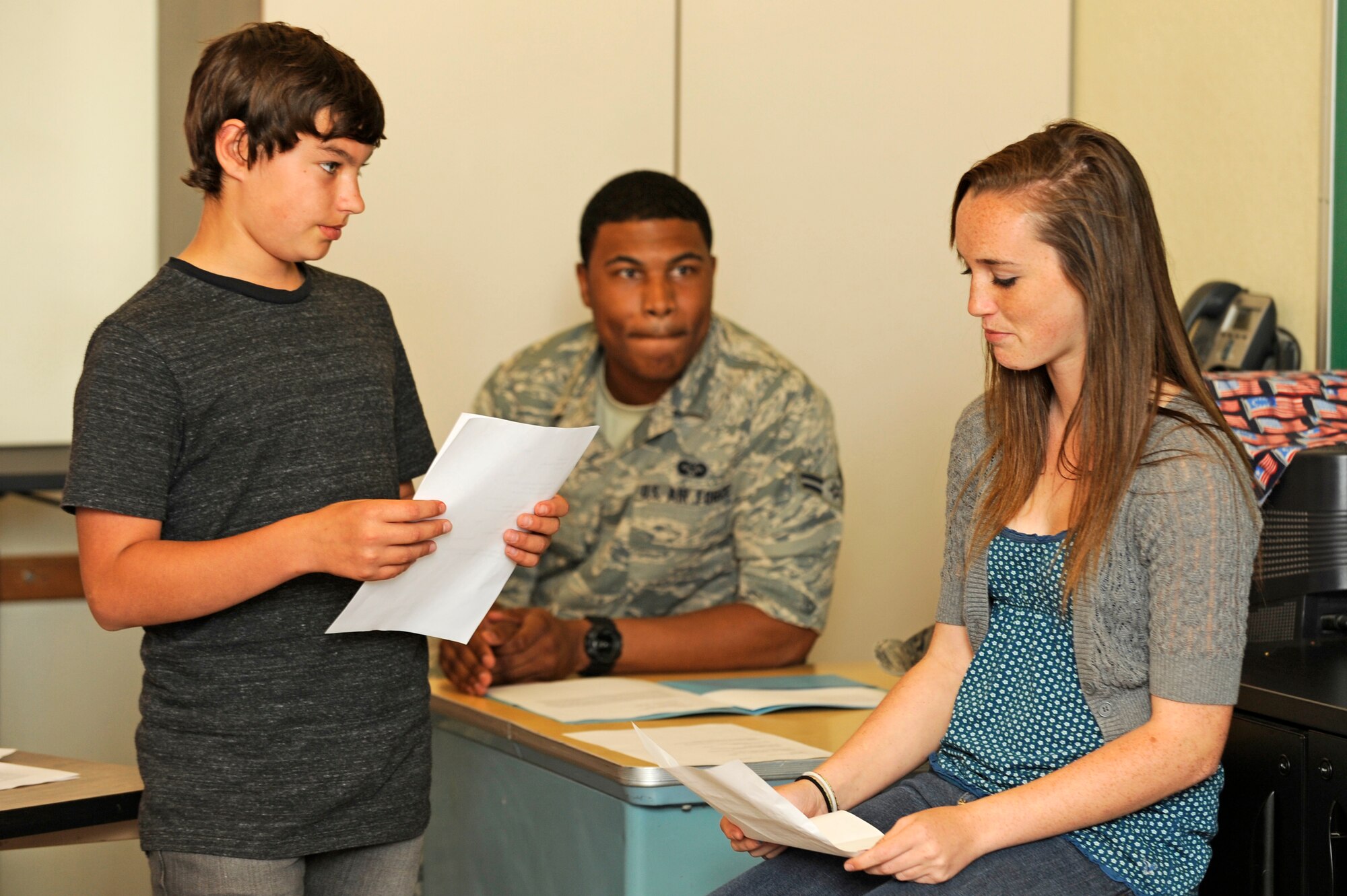 VANDENBERG AIR FORCE BASE, Calif. - Landon Trigueiro, a 7th grader at the Vandenberg Middle School, cross examines the first witness Tess Leach, an 8th grader at the VMS, during a mock trial for Public Law Day at Vandenberg Middle School here Friday, April 29, 2011. The mock trial is a tool used to teach children about the processes of the American legal system. (U.S. Air Force photo/Senior Airman Lael Huss)
  