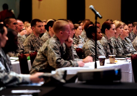 Airmen attending the 2011 Air Force Company Grade Officer Professional Development Conference listen intensely as Col. Lenny Richoux, 6th Air Mobility Wing commander, gives opening remarks May 2, 2011, at the Hyatt Regency Hotel Tampa, Fla.  The 2011 AFCGOC them is “Culture-Competence-Leadership: Joint Airmen for Tomorrow’s Battlefield.” Junior officers are briefed on current operations, culture, and customs of tribal regions in Afghanistan and Pakistan, and the many leadership opportunities in total force and joint environments, while still having the opportunity to interact with peers Air Force-wide. (U.S. Air Force Photo by Staff Sgt. Angela Ruiz)