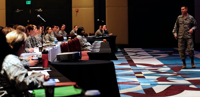 Col. Lenny Richoux, 6th Air Mobility Wing commander, welcomes Airmen attending the 2011 Air Force Company Grade Officer Professional Development Conference May 2, 2011 at the Hyatt Regency Hotel Tampa, Fla.  The 2011 AFCGOC them is “Culture-Competence-Leadership: Joint Airmen for Tomorrow’s Battlefield.” Junior officers are briefed on current operations, culture, and customs of tribal regions in Afghanistan and Pakistan, and the many leadership opportunities in total force and joint environments, while still having the opportunity to interact with peers Air Force wide. (U.S. Air Force Photo by Staff Sgt. Angela Ruiz)