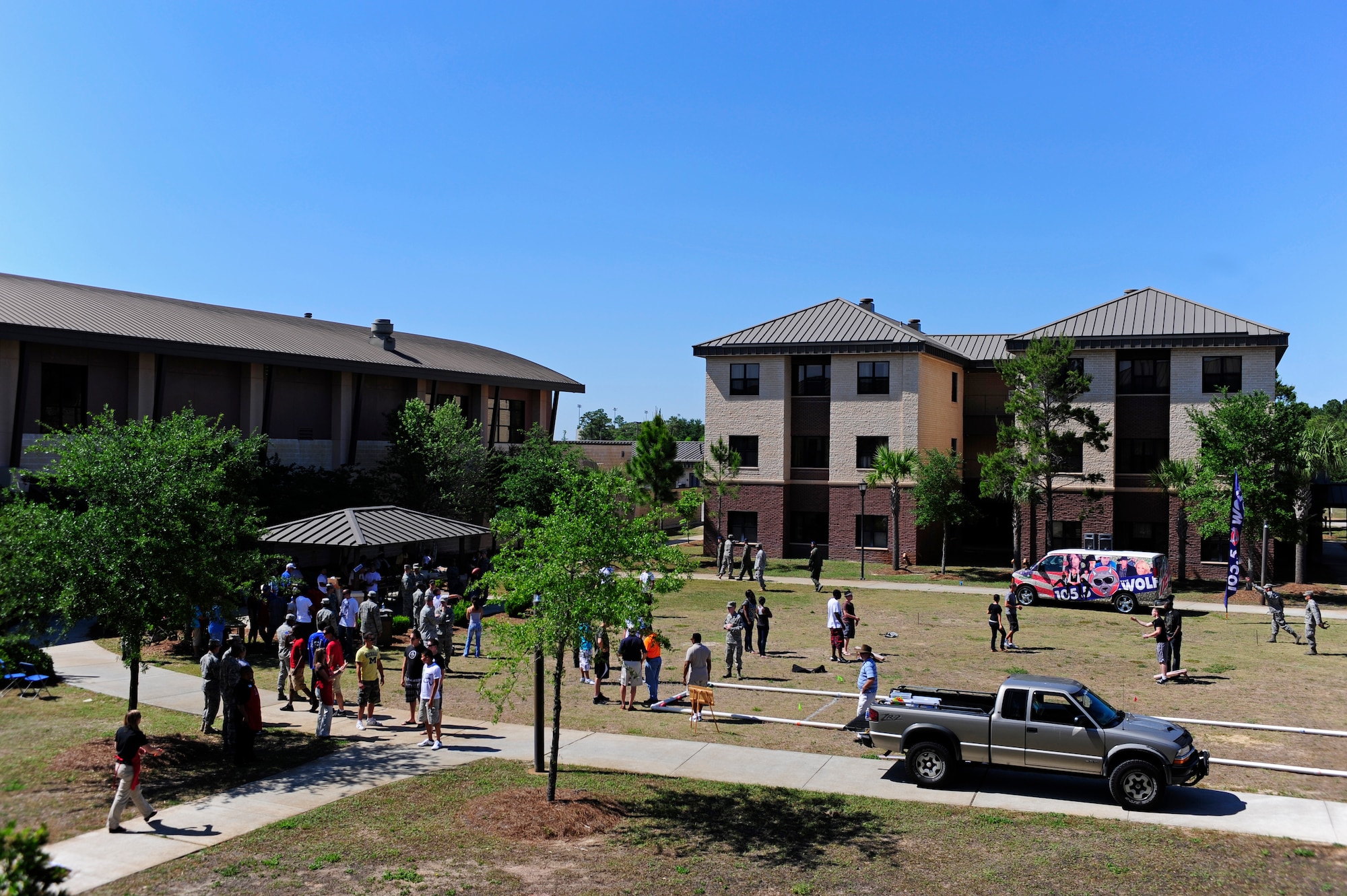 Hurlburt Field Airmen gather behind the Riptide Dining Facility for a dormitory picnic hosted by the Fort Walton Beach Military Affairs Committee, Hurlburt Field, Fla., April 28, 2011. Participants enjoyed playing games, winning prizes and socializing with fellow Air Commandos. (U.S. Air Force photo by Staff Sgt Julianne M. Showalter/Released)

