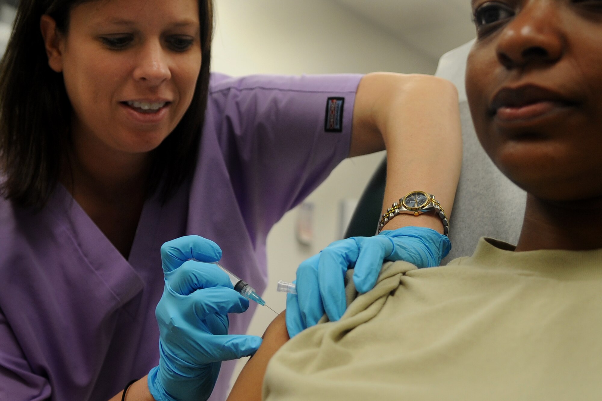 WHITEMAN AIR FORCE BASE, Mo. -- Tracy Caldwell, 509th Medical Operations Squadron disease management nurse, administers a shot during a training session May 3, 2011. The 509th Medical Group applauds their hard working nurses and medical technicians during National Nurses and Medical Technician Week. (U.S. Air Force photo by Senior Airman Kenny Holston)(Released)


