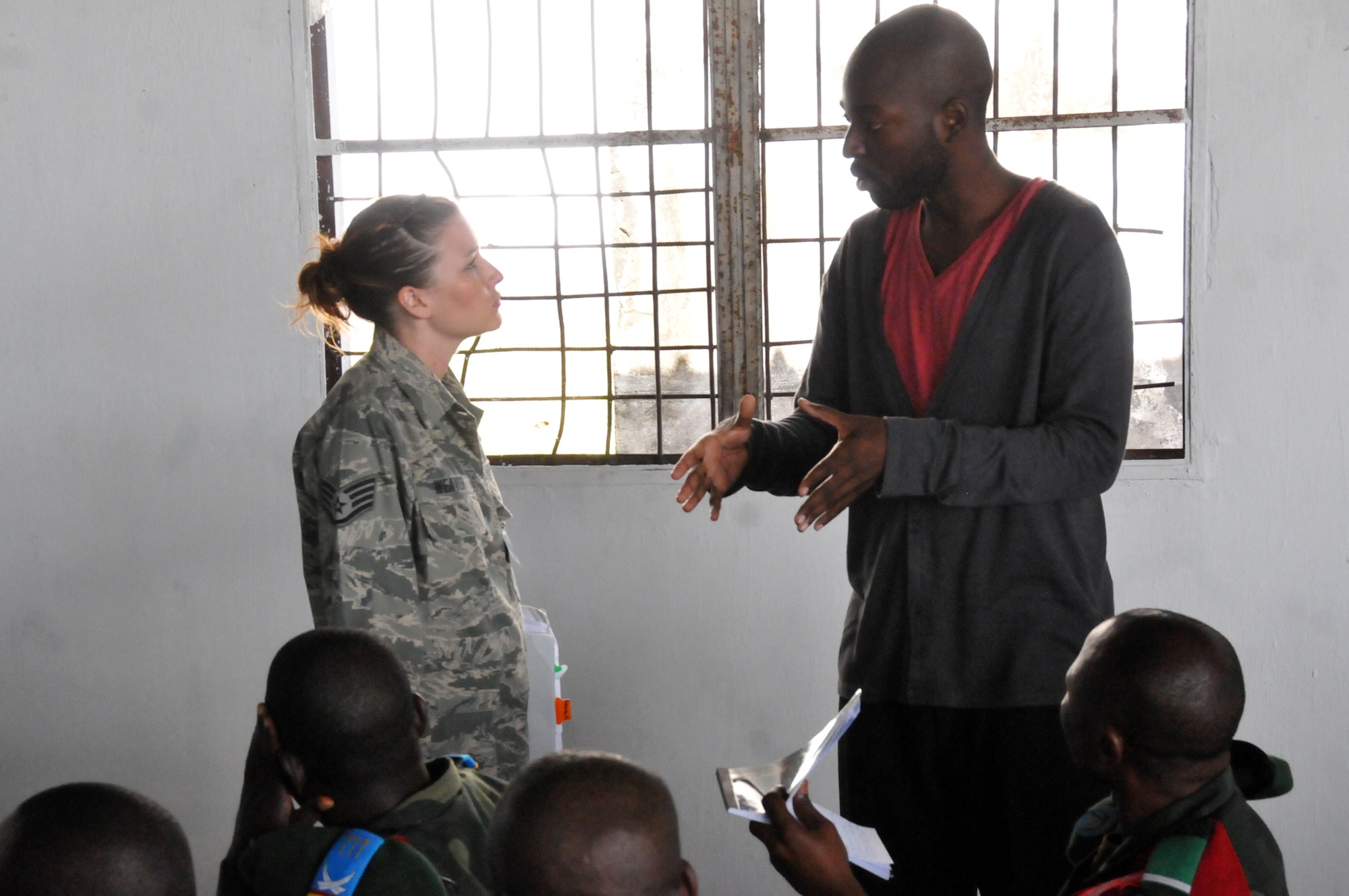 KINSHASA, Democratic Republic of the Congo ? Air Force Staff Sgt. Amber Weaver, an aeromedical evacuation technician with the Wyoming Air National Guard's 187th Aeromedical Evacuation Squadron, conducts training to members of the Democratic Republic of the Congo?s armed forces (FARDC) quick response force (UMIR), about aircraft capabilities of the C-130 Hercules during MEDLITE 11, May 2, 2011. (U.S. Air Force photo by Tech. Sgt. John Orrell)
