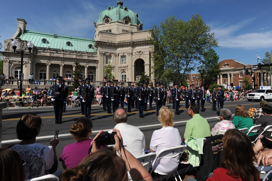 The U.S. Air Force Honor Guard halts during the parade to perform drill maneuvers for the crowd at the 84th Shenandoah Apple Blossom Festival April 30, Winchester Va. The USAF Honor Guard goes through an eight-week technical training school in order to perform in the local community to raise awareness of the Air Force mission. (U.S. Air Force photo by Senior Airman Christopher Ruano)