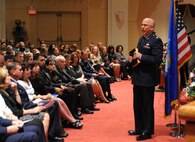 Capt. Sean Knox, 502nd Air Base Wing OL-B chaplain, speaks to friends, family and members of the Randolph community during a memorial service for Maj. Jeffrey Ausborn, 99th Flying Training Squadron instructor pilot, at the base theater May 3 at Randolph Air Force Base, Texas. The service honored Major Ausborn, who was killed April 27 in Kabul, Afghanistan. (U.S. Air Force photo/Rich McFadden)