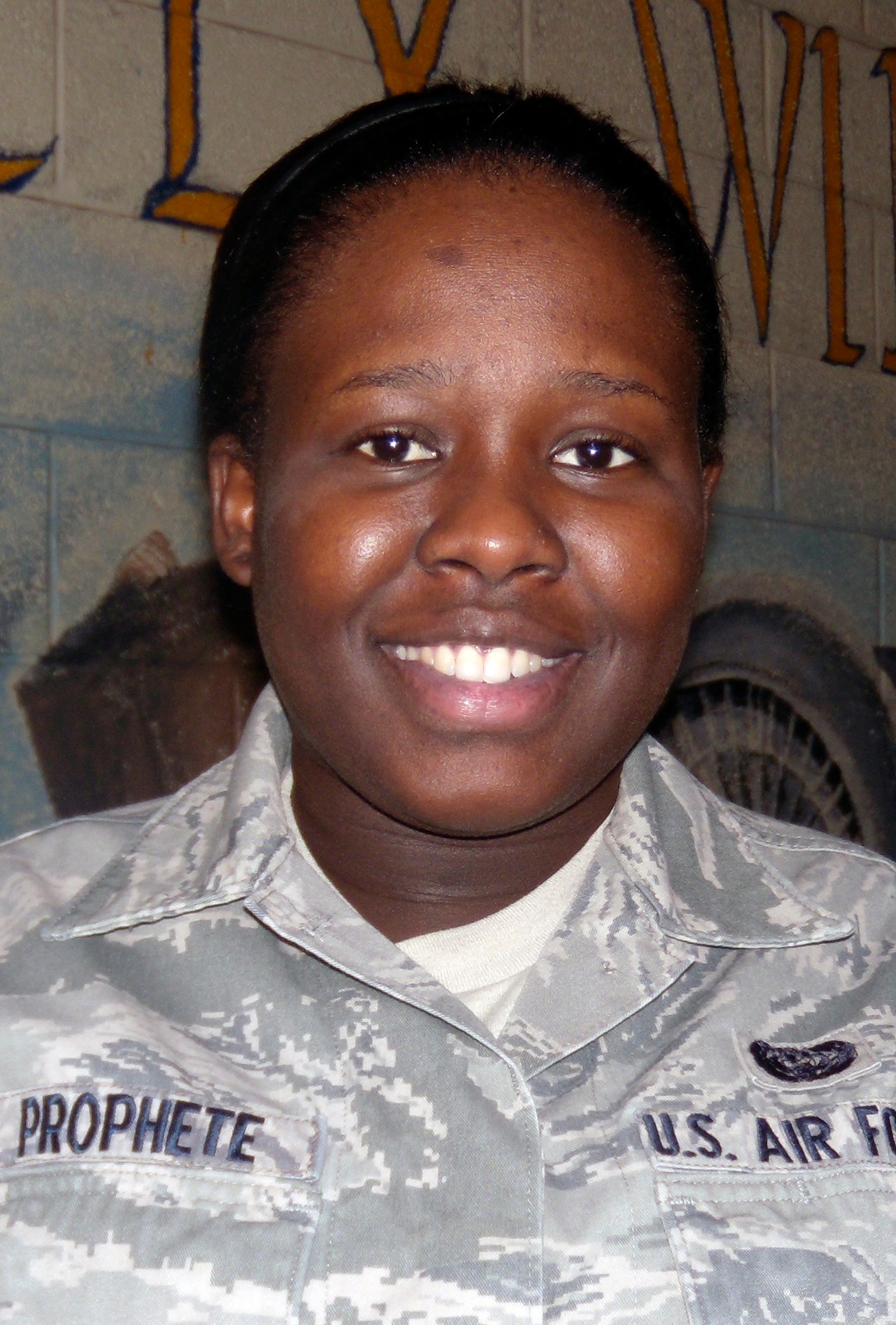 Members of the 512th Air Wing receive certificates of graduation April 15, 2011 at Dover Air Force Base, Del. The airmen graduated from a Leadership Development Course at Dover AFB.(U.S. Air Force photo by Adrian Rowan)
