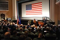 Col. Richard Murphy (right), 12th Flying Training Wing commander, addresses friends, family and members of the Randolph community during a memorial ceremony for Maj. Jeffrey Ausborn, 99th Flying Training Squadron instructor pilot, at the base theater May 3. Major Ausborn was killed April 27 in Kabul, Afghanistan. (U.S. Air Force photo/Rich McFadden)