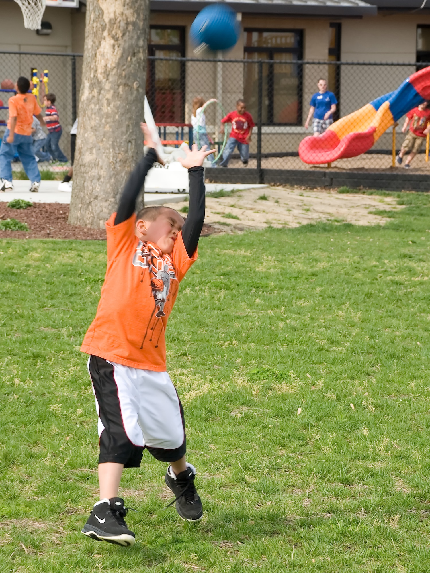 Damian Richardson attempts a catch May 2, 2011, at the Dover Air Force Base, Del., Youth Center. The Youth Center is holding a summer camp June 20 – Aug. 19, to keep the children active and learning over the summer break. (U.S. Air Force photo by Adrian Rowan)