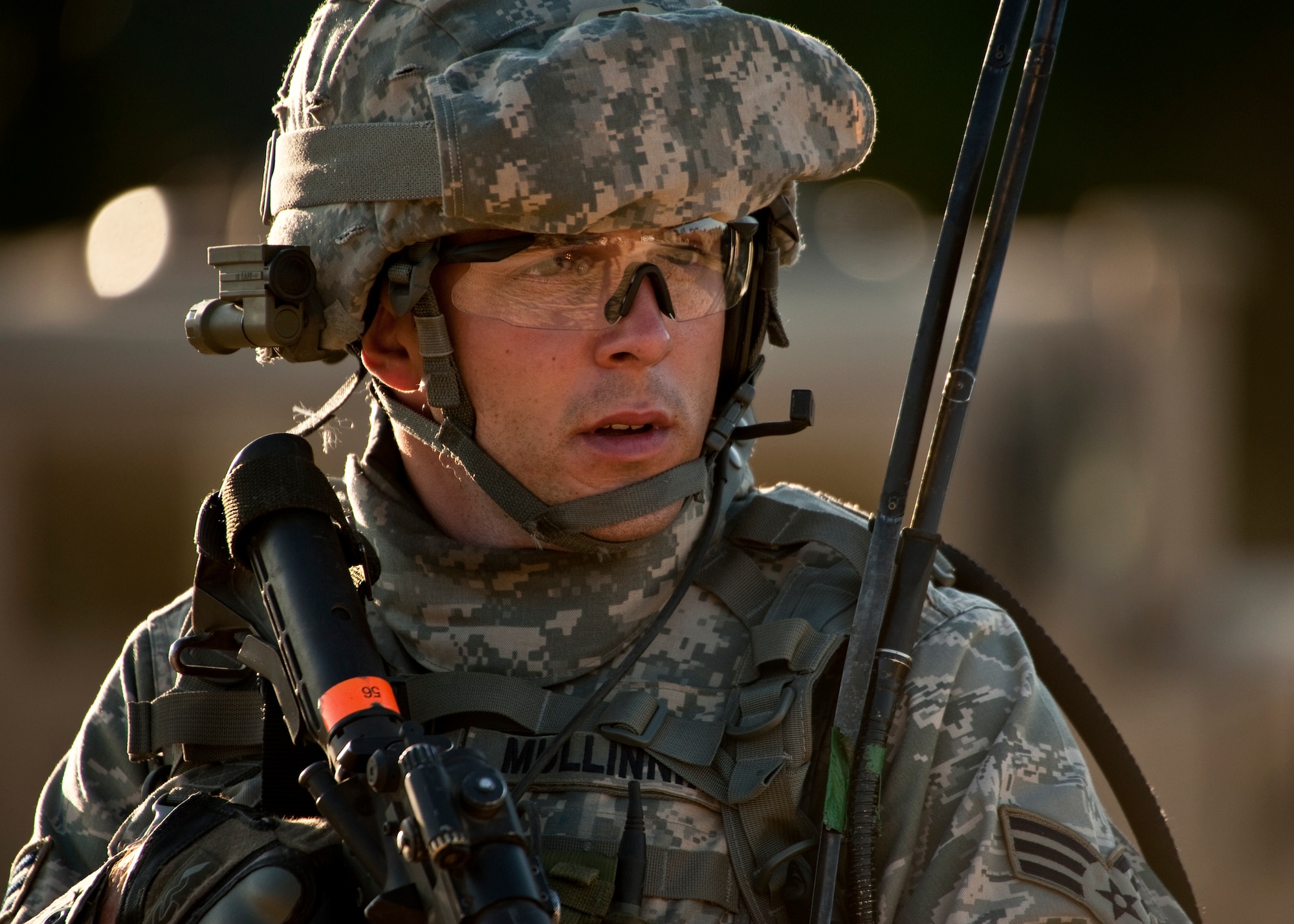 Senior Airman Bobby Mullinnix, 82nd Security Forces Squadron, watches a suspicious vehicle during a “mounted” patrol mission April 29 at Eglin Air Force Base, Fla.  This was part of Air Force Materiel Command’s "Brave Defender" training, which is administered by the 96th Ground Combat Training Squadron.  Teams of Airmen experienced both mounted (vehicle) and dismounted (foot) patrols through the forests and simulated villages around their base.  GCTS instructors push 10 training classes a year, which consists of improvised explosive device detection and reaction, operating in an urban environment, mission planning, land navigation and casualty care.  The three-week training culminates with a three-day field training exercise where the Airmen apply what they learned in combat scenarios.  More than 140 Airmen from more than 10 locations attended this training.  (U.S. Air Force photo/Samuel King Jr.)
