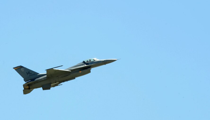 ABILENE, Texas -- An F-16 from Hill Air Force Base, Utah, performs April 30 at the Dyess Big Country Airfest here. The airfest is held at Abilene Regional Airport every other year and features various aircraft performances as well as static displays. The airfest is held to bring the Abilene and Dyess communities together and to demonstrate Air Force capabilities. (U.S. Air Force photo/ Senior Airman Chelsea Cummings)