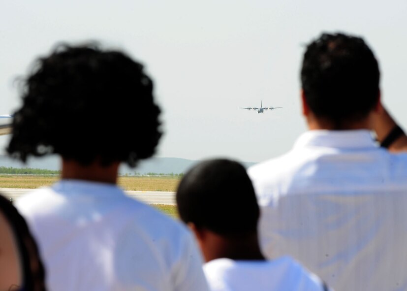 ABILENE, Texas -- A 317th Airlift Group C-130J performs a tactical approach April 30 at the Dyess Big Country Airfest here. The airfest is held at Abilene Regional Airport every other year and features various aircraft performances as well as static displays. The airfest is held to bring the Abilene and Dyess communities together and to demonstrate Air Force capabilities. (U.S. Air Force photo/ Senior Airman Chelsea Cummings)