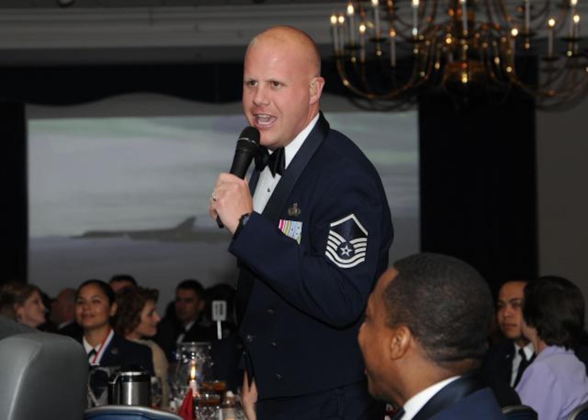 Master Sgt. Ryan Carson of The U.S. Air Force Band's Max Impact entertained AFDW 2011 Annual Awards Banquet attendees, held at The Club on Joint Base Anacostia-Bolling, Friday, April 29. (USAF Photo by Senior Airman Matthew Coleman-Foster)