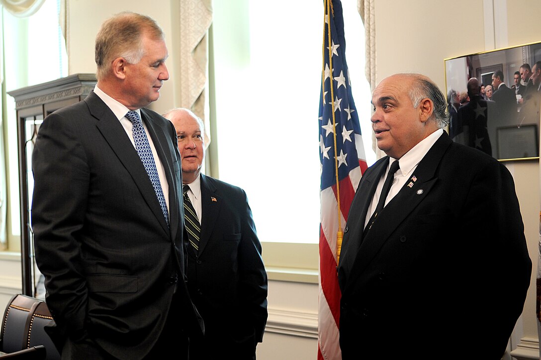 Deputy Defense Secretary William J. Lynn III, left, and Joseph W. Westphal, the Army's undersecretary, meet with George Kaho'ohanohano in Lynn's office before attending a ceremony for Korean War Medal of Honor recipient Army Pfc. Anthony Kaho'ohanohano and Pfc. Henry Svehla during their induction into the Hall of Heroes at the Pentagon, May 3, 2011. George Kaho'ohanohano is the recipient's nephew.