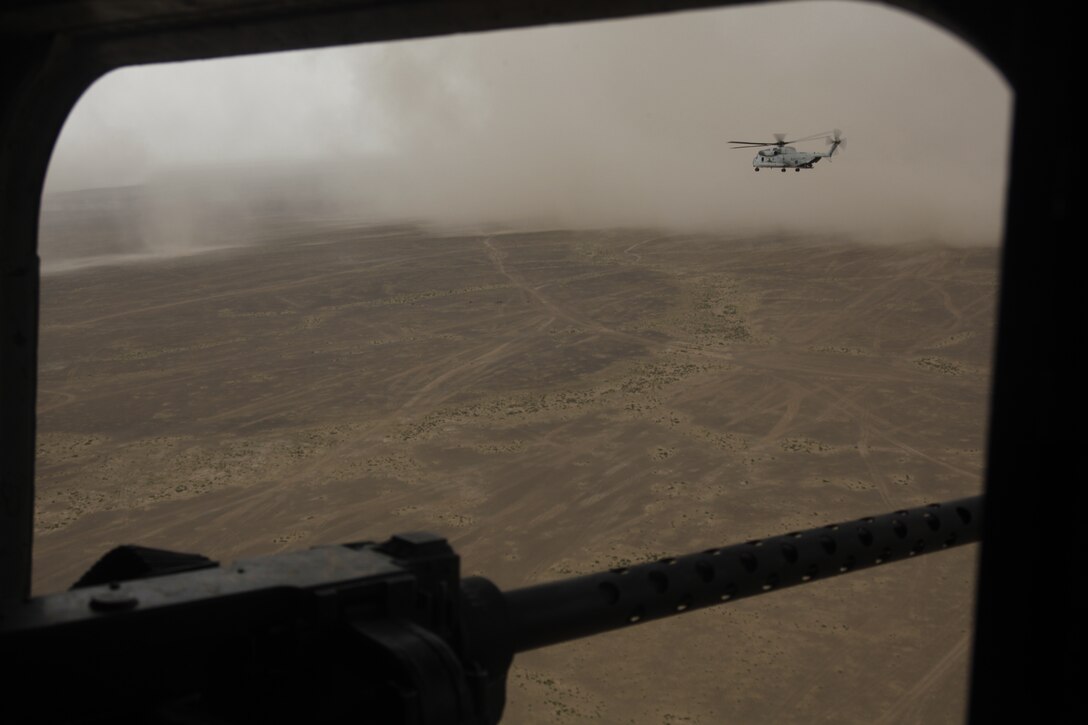 A sandstorm moves in while CH-53D Sea Stallions from Marine Heavy Helicopter Squadron 463 return from an aerial interdiction mission, in southwestern Afghanistan, May 4. Marine Heavy Helicopter Squadron 463 supplied two CH-53D Sea Stallions to support Marines from RCT-1 while they performed searches of vehicles traveling near Afghanistan’s southwestern border with Pakistan.