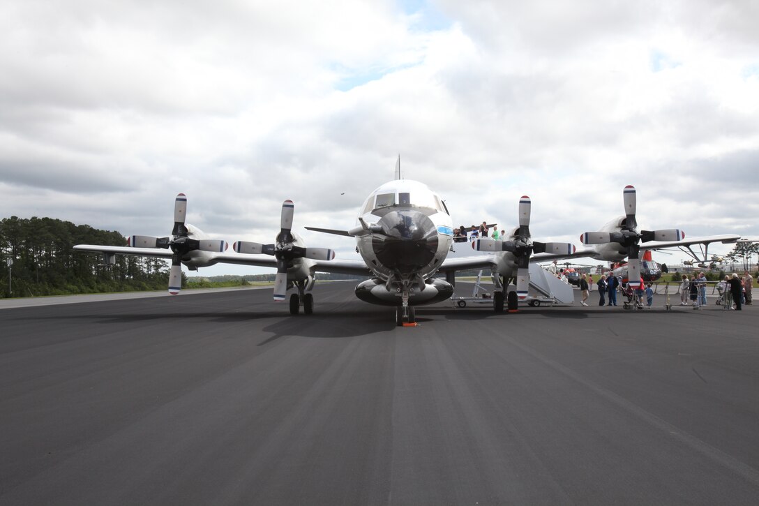Marines, Sailors and civilians aboard Cherry Point tour a WP-3D Orion the National Oceanic and Atmospheric Administration uses for hurricane hunting during NOAA’s East Coast Hurricane Awareness Tour May 4. Aircraft like this one are vital for forecasters to make accurate predictions concerning the path of a storm. In 2005, the hurricane hunters ensured the successful forecasting of Hurricane Katrina.