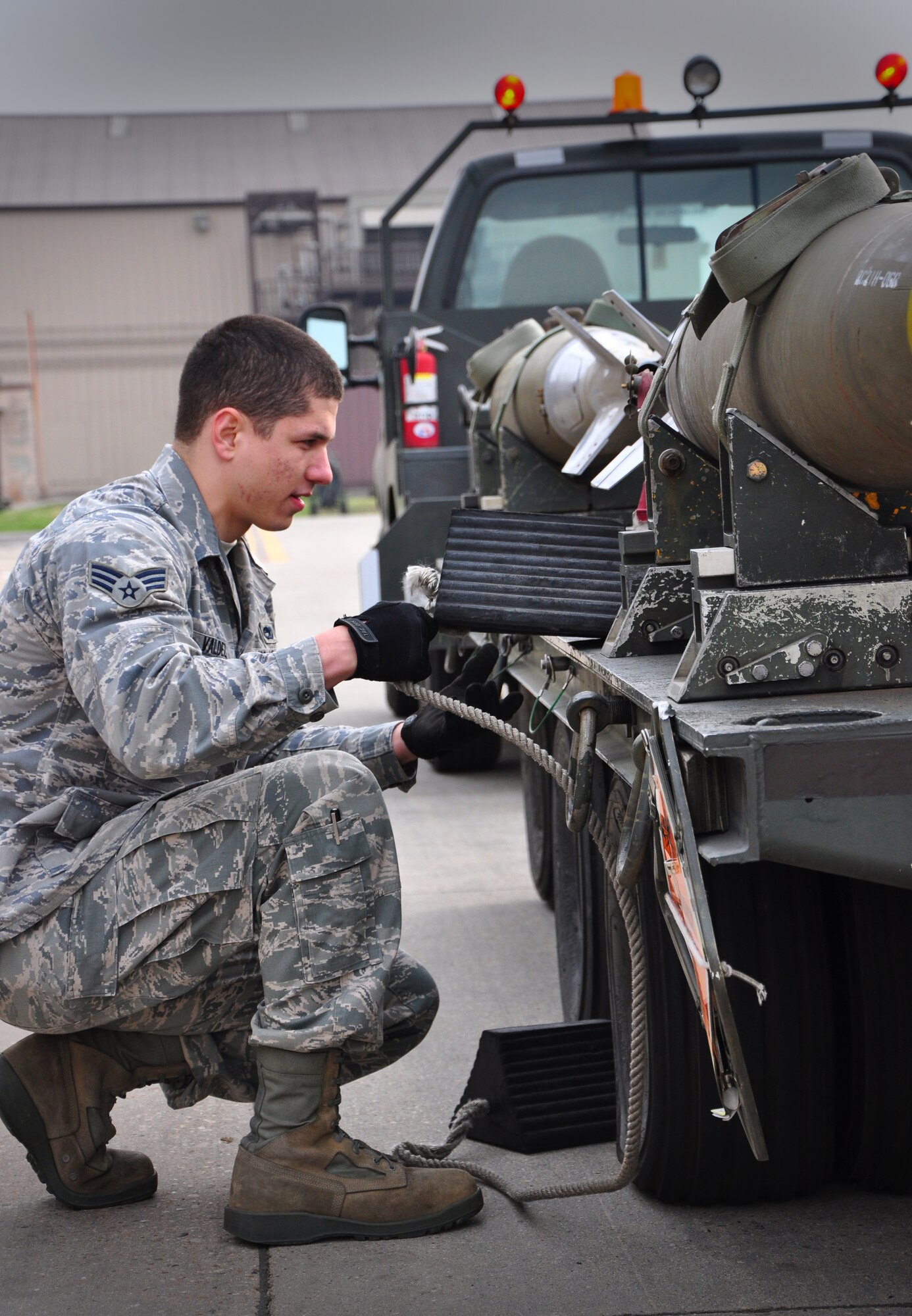 Airmen with the 51st Munitions Squadron and the 25th Aircraft Maintenance Unit recently worked together at building and loading some munitions onto an A-10 here. 51st MUNS built a dozen Mk-82 500-pound, free-fall, general-purpose bombs in order to hone and practice their skills. The Airmen then delivered the munitions to the Draggins Lair where the 25th AMU Airmen loaded an A-10. (U.S. Air Force photo/Staff Sgt. Chad Thompson)