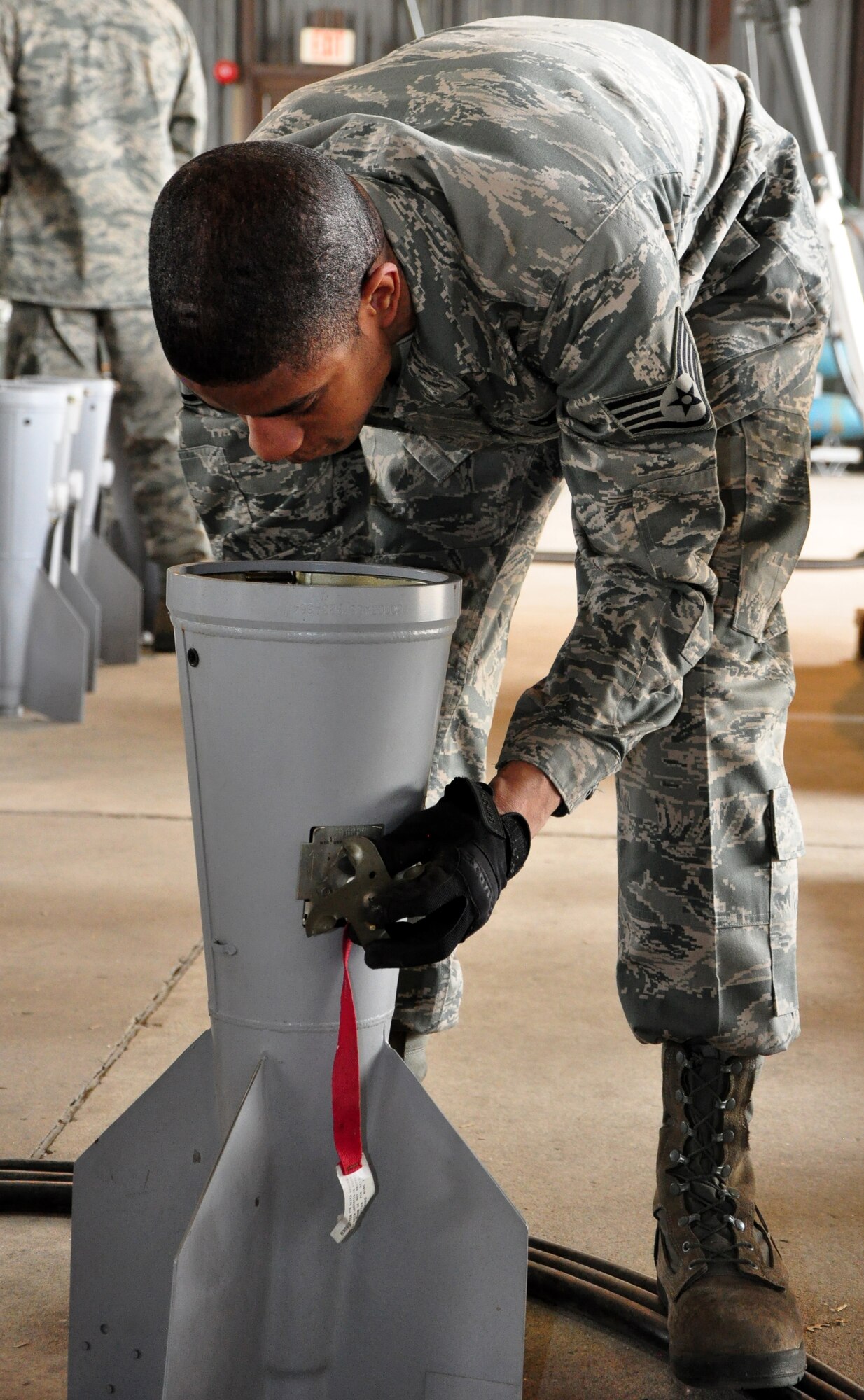Airmen with the 51st Munitions Squadron and the 25th Aircraft Maintenance Unit recently worked together at building and loading some munitions onto an A-10 here. 51st MUNS built a dozen Mk-82 500-pound, free-fall, general-purpose bombs in order to hone and practice their skills. The Airmen then delivered the munitions to the Draggins Lair where the 25th AMU Airmen loaded an A-10. (U.S. Air Force photo/Staff Sgt. Chad Thompson)