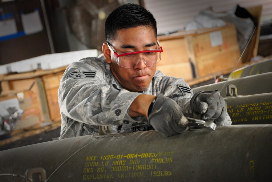 Airmen with the 51st Munitions Squadron and the 25th Aircraft Maintenance Unit recently worked together at building and loading some munitions onto an A-10 here. 51st MUNS built a dozen Mk-82 500-pound, free-fall, general-purpose bombs in order to hone and practice their skills. The Airmen then delivered the munitions to the Draggins Lair where the 25th AMU Airmen loaded an A-10. (U.S. Air Force photo/Staff Sgt. Chad Thompson)