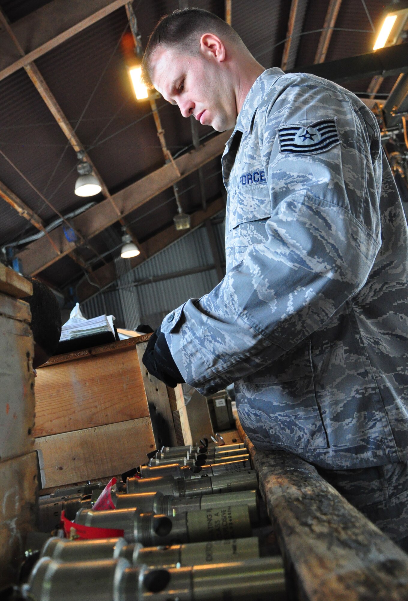 Airmen with the 51st Munitions Squadron and the 25th Aircraft Maintenance Unit recently worked together at building and loading some munitions onto an A-10 here. 51st MUNS built a dozen Mk-82 500-pound, free-fall, general-purpose bombs in order to hone and practice their skills. The Airmen then delivered the munitions to the Draggins Lair where the 25th AMU Airmen loaded an A-10. (U.S. Air Force photo/Staff Sgt. Chad Thompson)