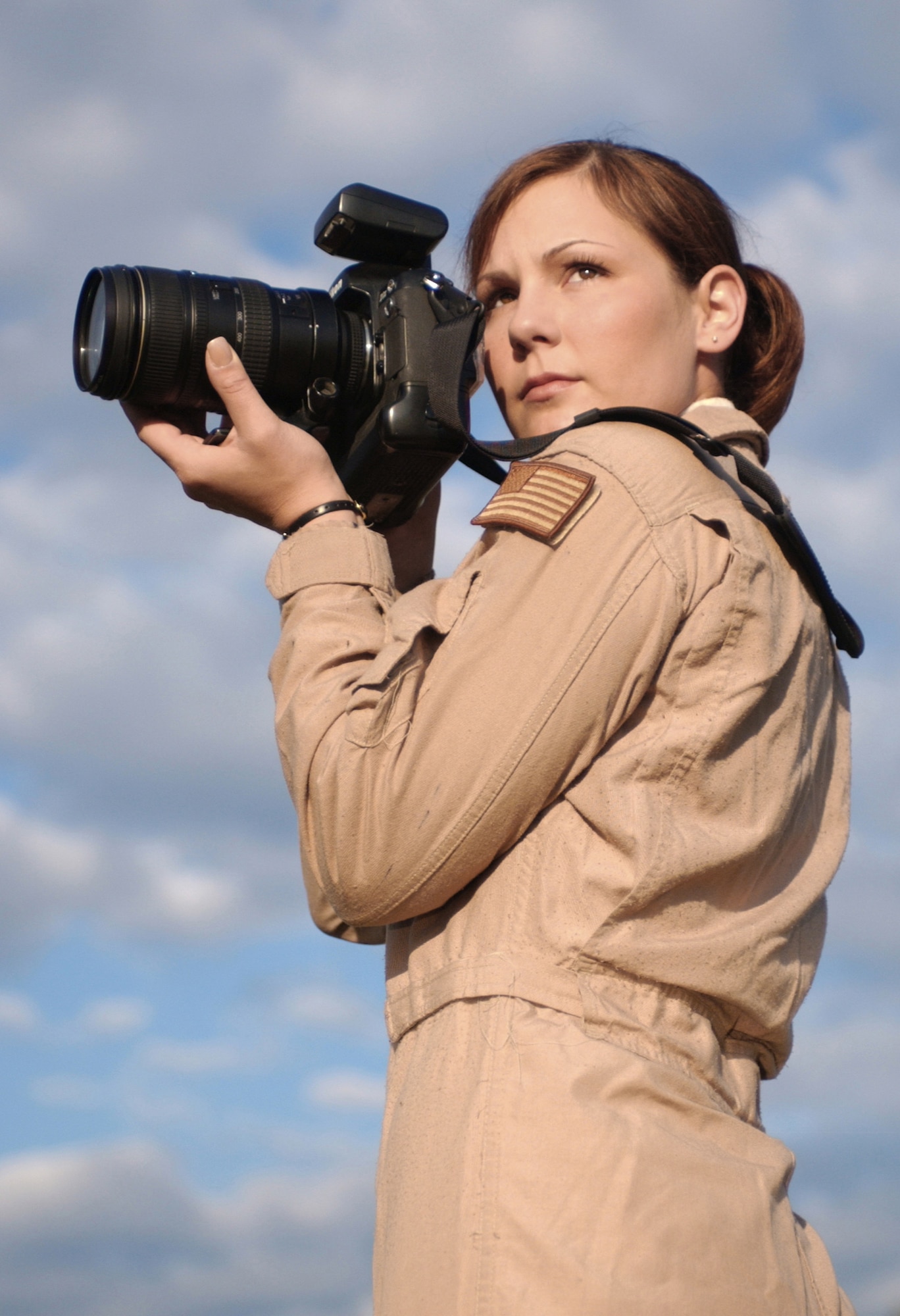 Now retired Staff Sgt. Stacy Pearsall, a combat photographer, serves a tour of duty in Iraq. (Courtesy photo)