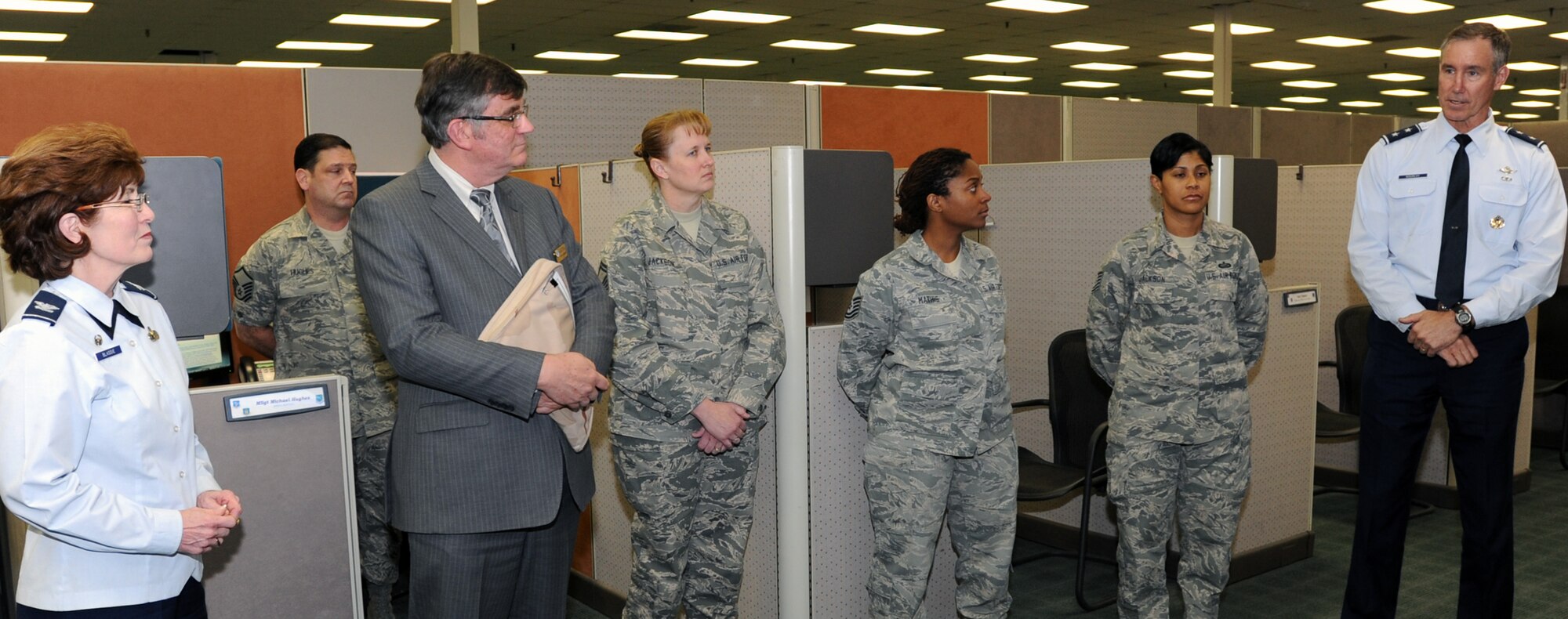 Maj. Gen. Craig N. Gourley, Vice Commander, Air Force Reserve Command is briefed on Total Force Service Center - Denver operations by ARPC personnel during a recent visit.  (Photo by Kevin Bell)