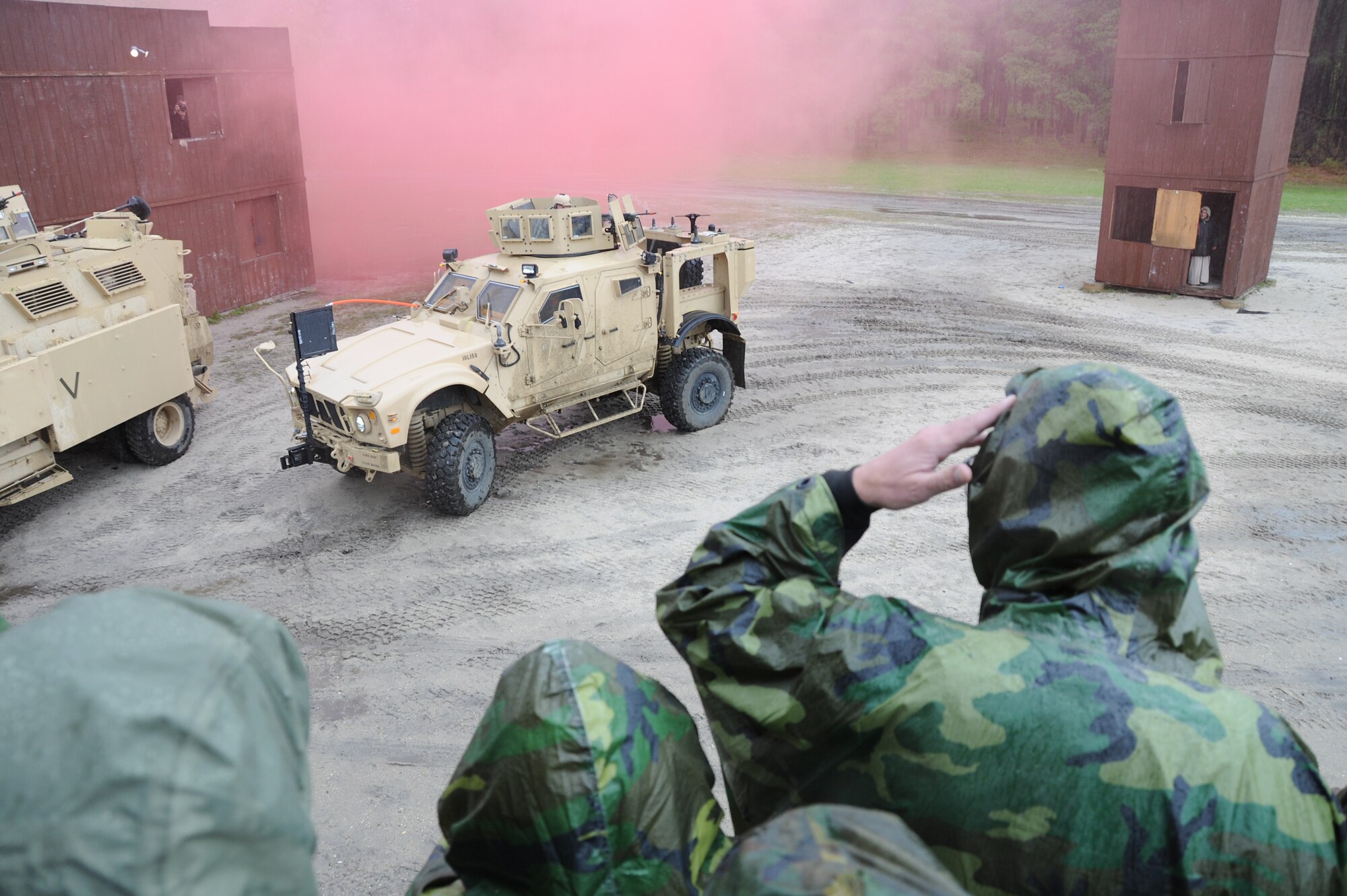 Civilians visiting the U.S. Air Force Expeditionary
Center as part of a Department of Defense civic outreach program watch
Airmen operate a convoy of M-ATV Mine Resistant Ambush Protected vehicles
during a demonstration May 4th at Joint Base McGuire-Dix-Lakehurst.
Approximately 50 civilians representing various fields are participating in
the weeklong Joint Civilian Orientation Conference to learn about the U.S.
military and its capabilities (U.S. Air Force photo by Staff Sgt. Nathaniel
Bevier/Released)
