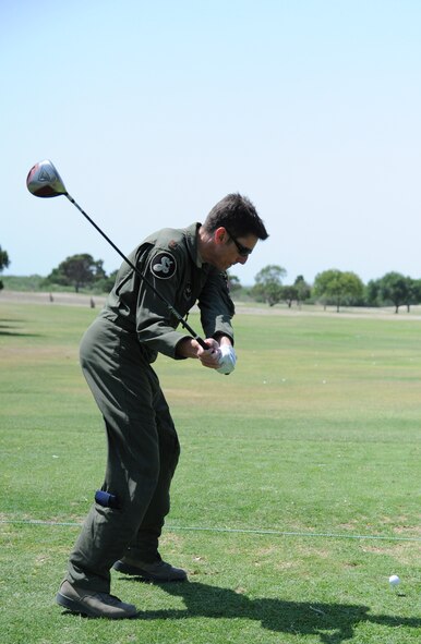 LAUGHLIN AIR FORCE BASE, Texas – Major Robert Kain, 47th Mission Support Group, tries out a golf club at the Demo Day event at Laughlin’s Leaning Pines Golf Course April 29. Several Laughlin members attended the event to sample the provided equipment and enjoy the free lunch that was provided by the 47th Force Support Squadron. (U.S. Air Force photo by Airman 1st Class Blake Mize)
