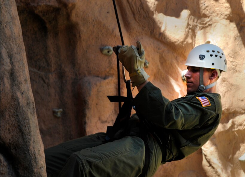 MOODY AIR FORCE BASE, Ga. -- U.S. Air Force Academy Cadet Ryan Kolesar repels down a rock wall April 29. After a demonstration by pararescuemen, the cadets had the opportunity to try repelling down the rock wall. (U.S. Air Force photo/Airman 1st Class Jarrod Grammel)(RELEASED)