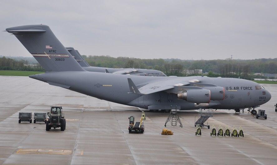 WRIGHT-PATTERSON AIR FORCE BASE, Ohio - A spring rain shower highlights a 445th Airlift Wing C-17 Globemaster III May 3. The wing is currently transitioning from the C-5 Galaxy to the C-17. (U.S. AIr Force photo/Stacy Vaughn) 