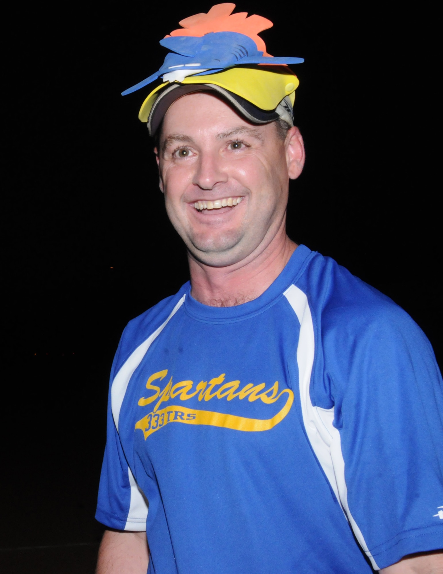 Alan Banks, 333rd TRS, had the dubious privilege of getting to wear a special Spartan hat for striking out at bat during an intramural softball game April 28.  His team beat the 336th TRS, 19-2.  (U.S. Air Force photo by Kemberly Groue)
