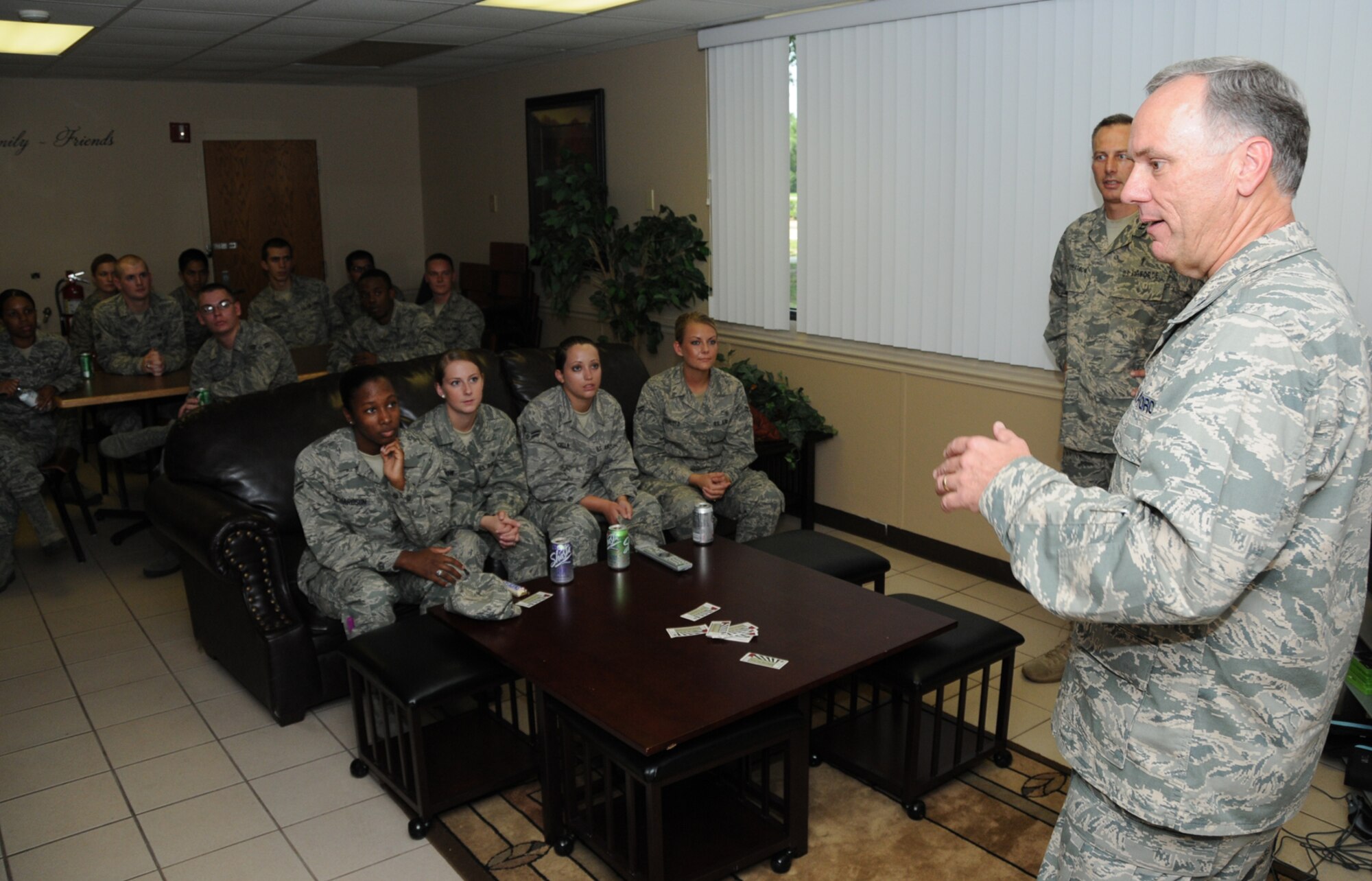 Chaplain Perry welcomes Airmen to The Haven, a communal area inside the permanent party dorms where students gather to make friends, have discussion and prayer groups and support each other in Air Force life.  (U.S. Air Force photo by Kemberly Groue)
