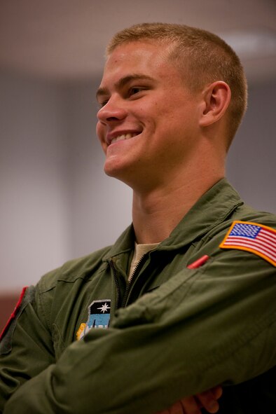 MOODY AIR FORCE BASE, Ga.-- U.S. Air Force cadet Joseph Euhus observes as another cadet takes the controls of an A-10 simulator during a base tour April 29. Each cadet had a chance to take the wheel inside a C-130 and A-10 simulator during their visit. (U.S. Air Force photo/Airman 1st Class Benjamin Wiseman)(RELEASED)