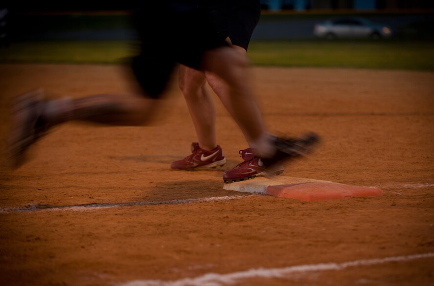 MOODY AIR FORCE BASE, Ga.-- With the game being tied late and the competiveness rising during an intramural softball game, a key play is made at first base May 2. The 723rd Aircraft Maintenance Squadron took over and gained a victory with a final score of 17-16 over the 23rd Medical Group. (U.S. Air Force photo/Airman 1st Class Joshua Green)(RELEASED)
