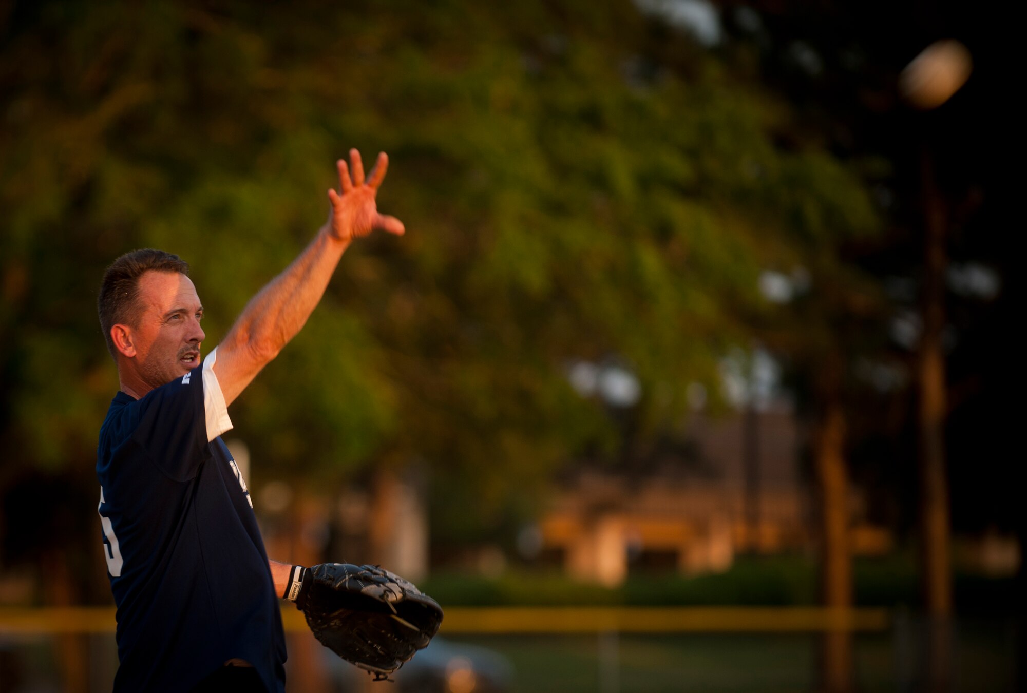 MOODY AIR FORCE BASE, Ga.-- Thomas Sullivan, 23rd Medical Group intramural team pitcher, tosses a pitch to the opposing team during a softball game May 2. The 23rd MDG broke out with a big lead to start the game, but the 723rd Aircraft Maintenance Squadron fought back to gain the victory 17-16. (U.S. Air Force photo/Airman 1st Class Joshua Green)(RELEASED)
