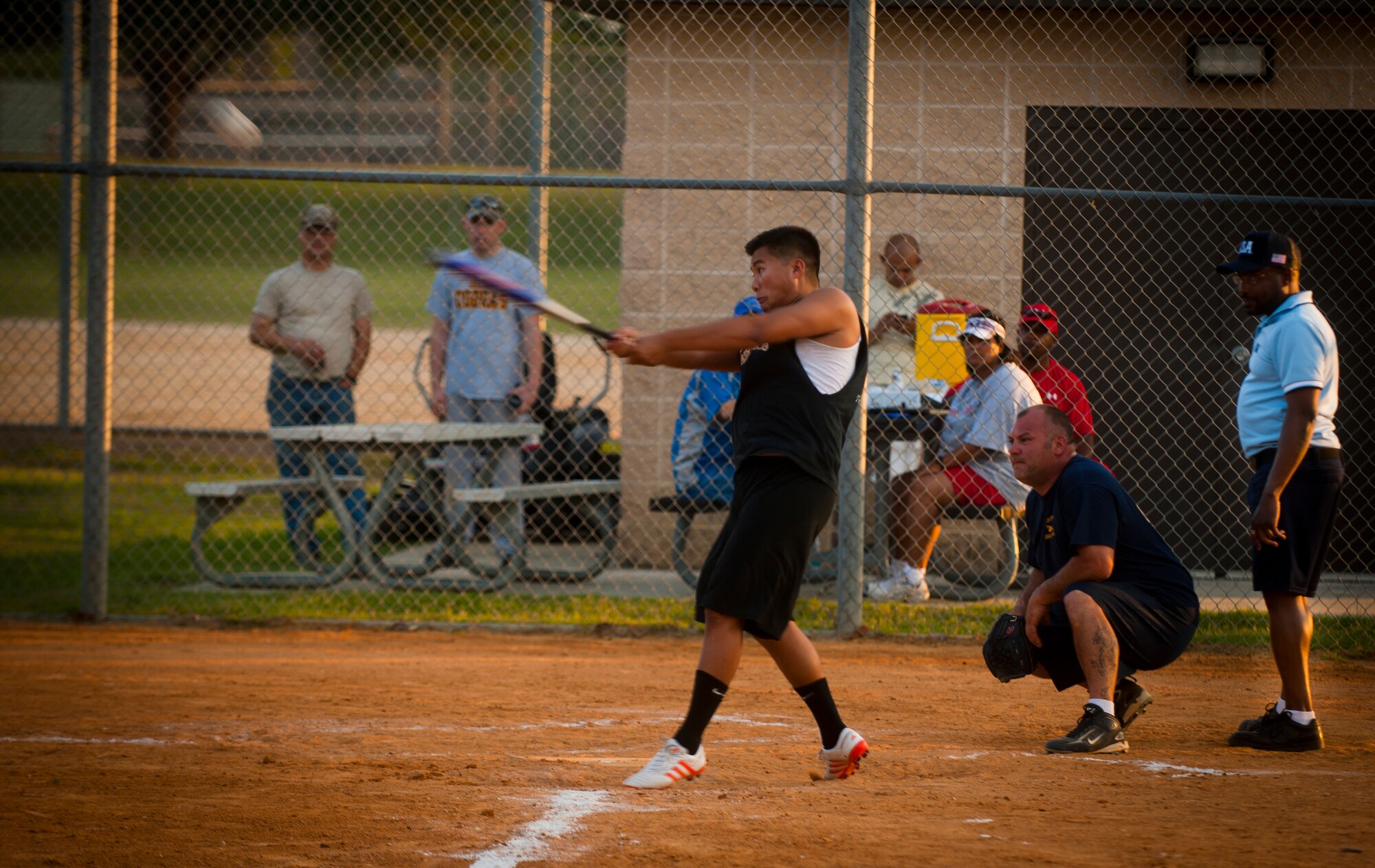 MOODY AIR FORCE BASE, Ga.-- Kevin Blevins, 23rd Medical Group intramural team center fielder, gets a base hit off a pitch from the opposing team’s pitcher May 2. The 23rd MDG intramural softball team faced-off against the 723rd Aircraft Maintenance Squadron during the opening day of the season.(U.S. Air Force photo/Airman 1st Class Joshua Green)(RELEASED)
