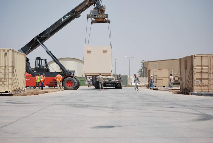 WRIGHT-PATTERSON AIR FORCE BASE, Ohio - More than 40 Airmen from the 445th Airlift Wing’s 87th Aerial Port Squadron are currently deployed with the 332nd Expeditionary Logistics Readiness Squadron, Joint Base Balad, Iraq.  Here, Airmen from the 332 ELRS are preparing equipment to be shipped. (Courtesy photo) 