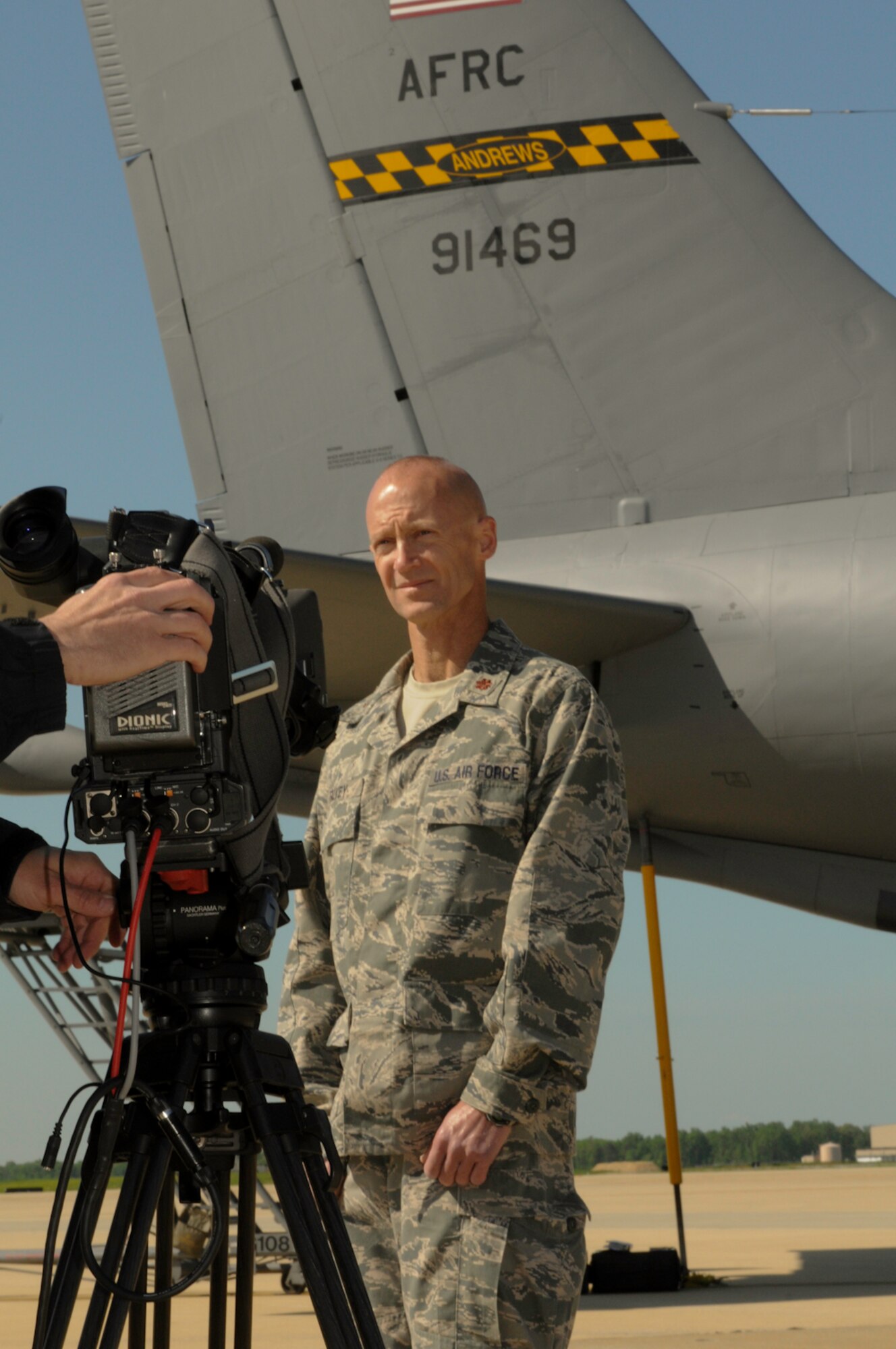 JOINT BASE ANDREWS, Md. -- Maj. Patrick Falvey, 459th Aeromedical Staging Squadron, critical care nurse, is filmed by a cameraman from Contrast Creative Apr. 30 here for a media project being organized by Duke University Hospital. In his civilian job, Major Falvey is a Life Flight nurse at the hospital. Some of Duke's patients and employees, including Major Falvey, are being featured in the upcoming film which documents their inspiring life stories and how they tie into the hospital. (U.S. Air Force photo/Staff Sgt. Sophia Piellusch)