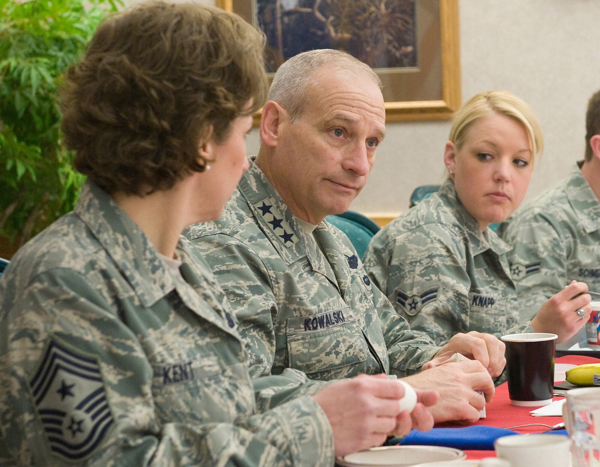 341st Missile Wing Command Chief Master Sgt. Cari Kent and Airman 1st Class  Kimbra Knapp listen for Lt. Gen. James Kowalski's next remarks during an Airman's breakfast at the Elkhorn Diner April 26. Air Force Global Strike Command's top leader was at Malmstrom April 25-27 for an orientation tour. (U.S. Air Force photo/Beau Wade)