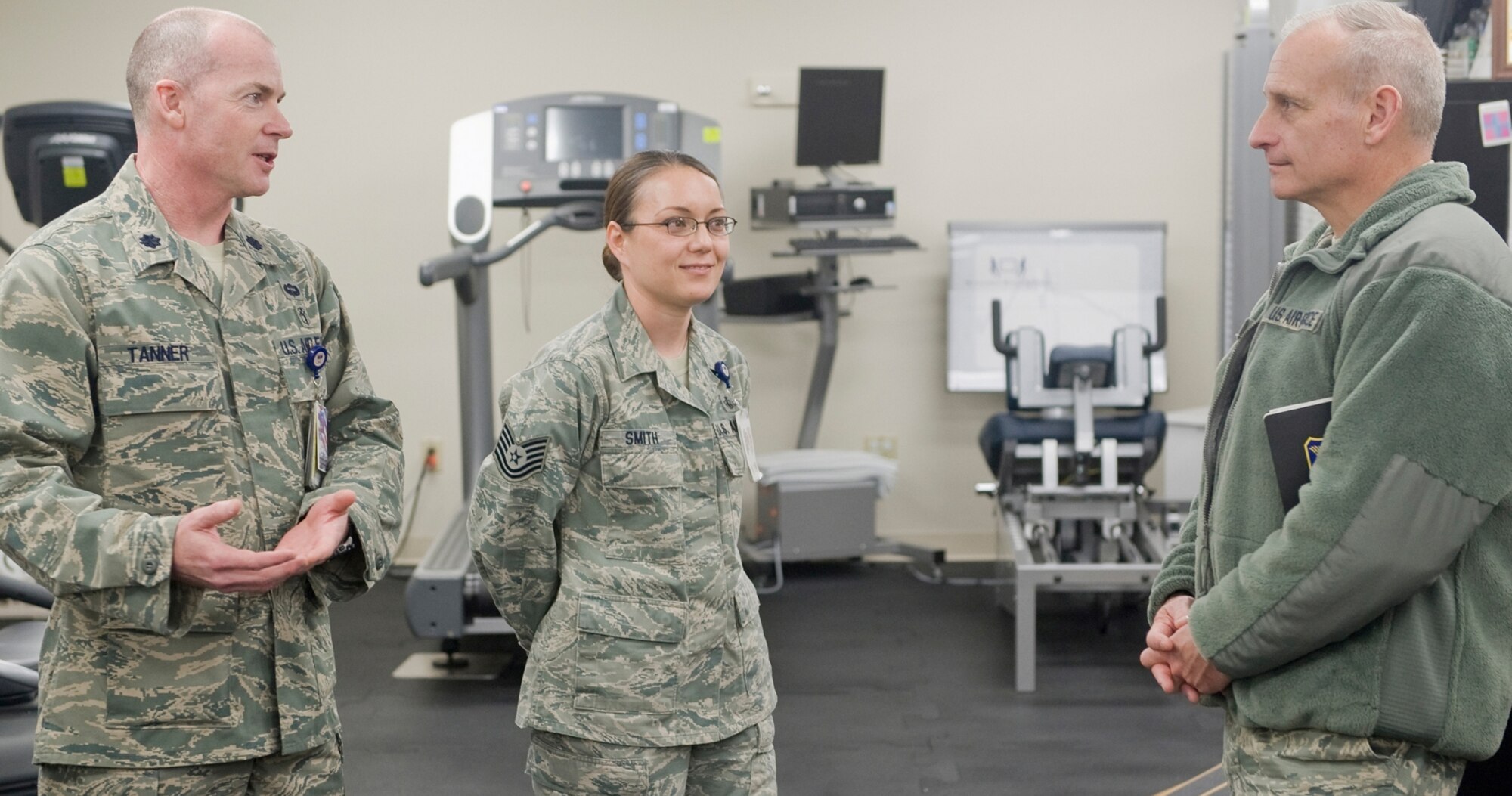 Lt. Col. James Tanner, Chief of Physical Therapy, and Tech. Sgt. Shizuko Smith, physical therapy technician, explain their operations to Lt. Gen. James Kowalski, Air Force Global Strike Command commander, on his tour of the 341st Medical Group clinic April 26. (U.S. Air Force photo/Beau Wade)