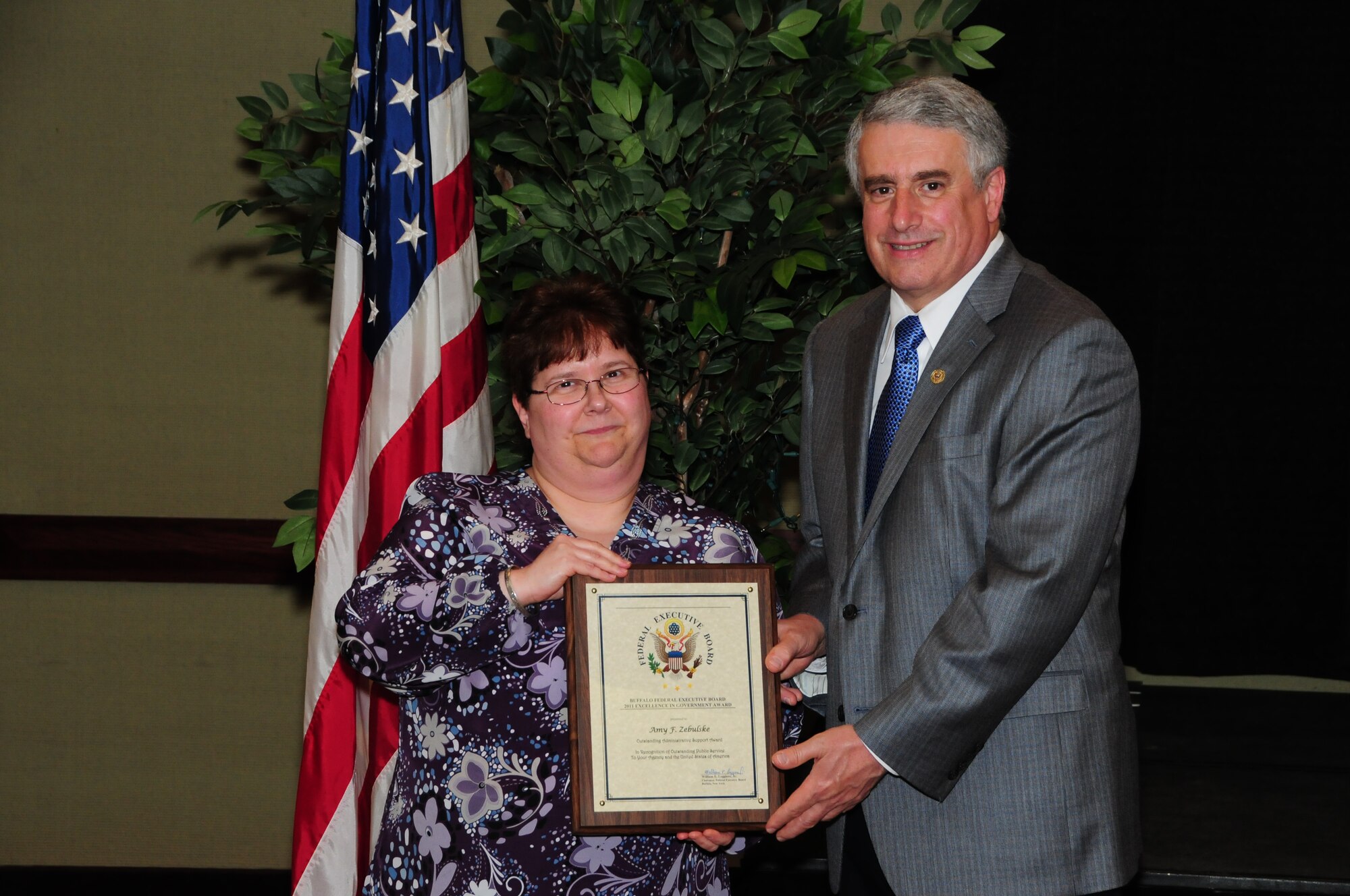 BUFFALO, N.Y.- Ms. Amy Zebulske, 914th Airlift Wing management assistant, was presented with the Outstanding Administrative Support Award for her management of 11 key administrative programs for the Logistics Readiness Squadron from Mr. William E. Leggiero, Jr., Buffalo Federal Executive Board Chairman. The Excellence in Government Awards Ceremony was held at the Buffalo Convention Center.  The 914th Airlift Wing was among many  other federal agencies represented at the ceremony. The wing had seven members win in six different categories. (U.S. Air Force Reserve photo by Peter Borys)