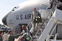 Colonels Randy Ogden and Caroline Evernham (bottom left) welcome home members of the 916th Air Refueling Wing upon their return from Turkey and Qatar. (USAF photo by Ms. Donna Lea, 916ARW/PA)