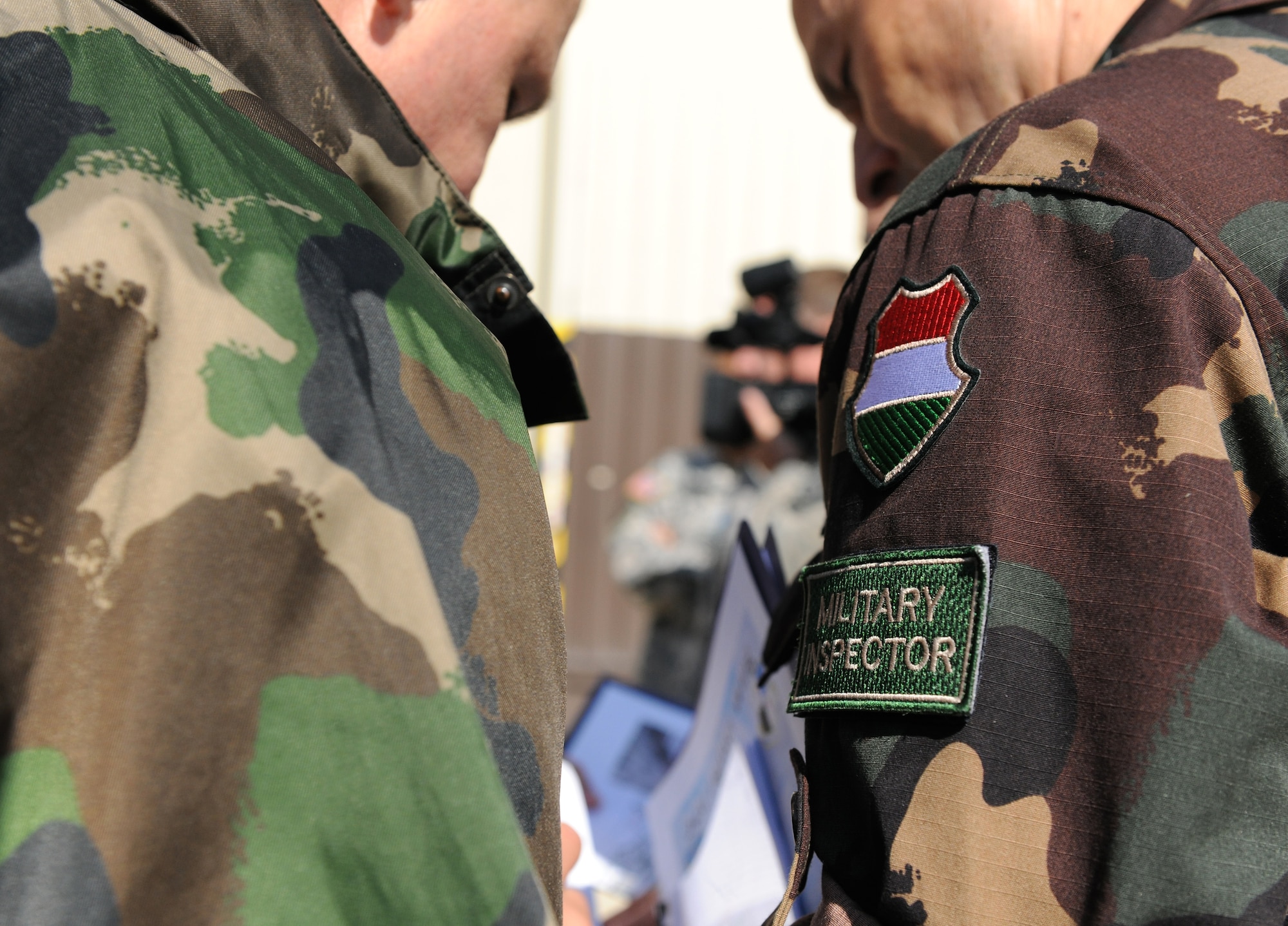 SPANGDAHLEM AIR BASE, Germany – Hungarian Defence Forces Lt. Col. Kalman Nemeth, right, Hungarian treaty compliance inspection team leader, explains a compliance question to a team member during Conventional Armed Forces in Europe and Vienna Document 1999 treaty compliance exercises here May 3. Members of the Hungarian Defence Forces inspected the 52nd Fighter Wing as part of a trilateral training event. (U.S. Air Force photo/Senior Airman Nathanael Callon)